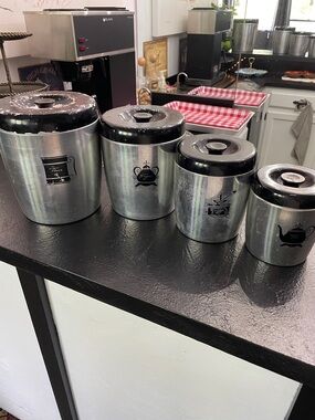 Vintage West Bend Silver Metal Kitchen Canister Set with Black Lids - 4 Piece